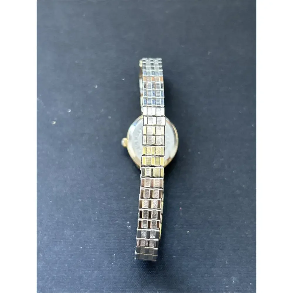 Gold Tone Oval Case Women’s Stretch Band Quartz Watch